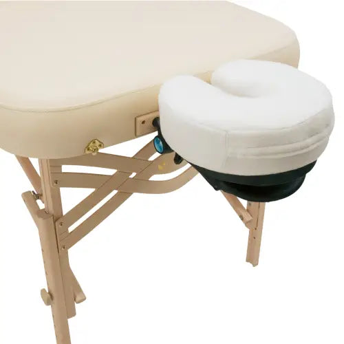 Ergonomic face cradle and massage pillow designed for comfort, proper positioning, and relaxation during massage and spa treatments.
