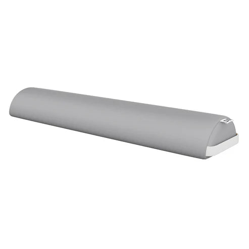 gray semicircular massage bolster pillow with leather upholstery and carrying handle for spa or salon tables.