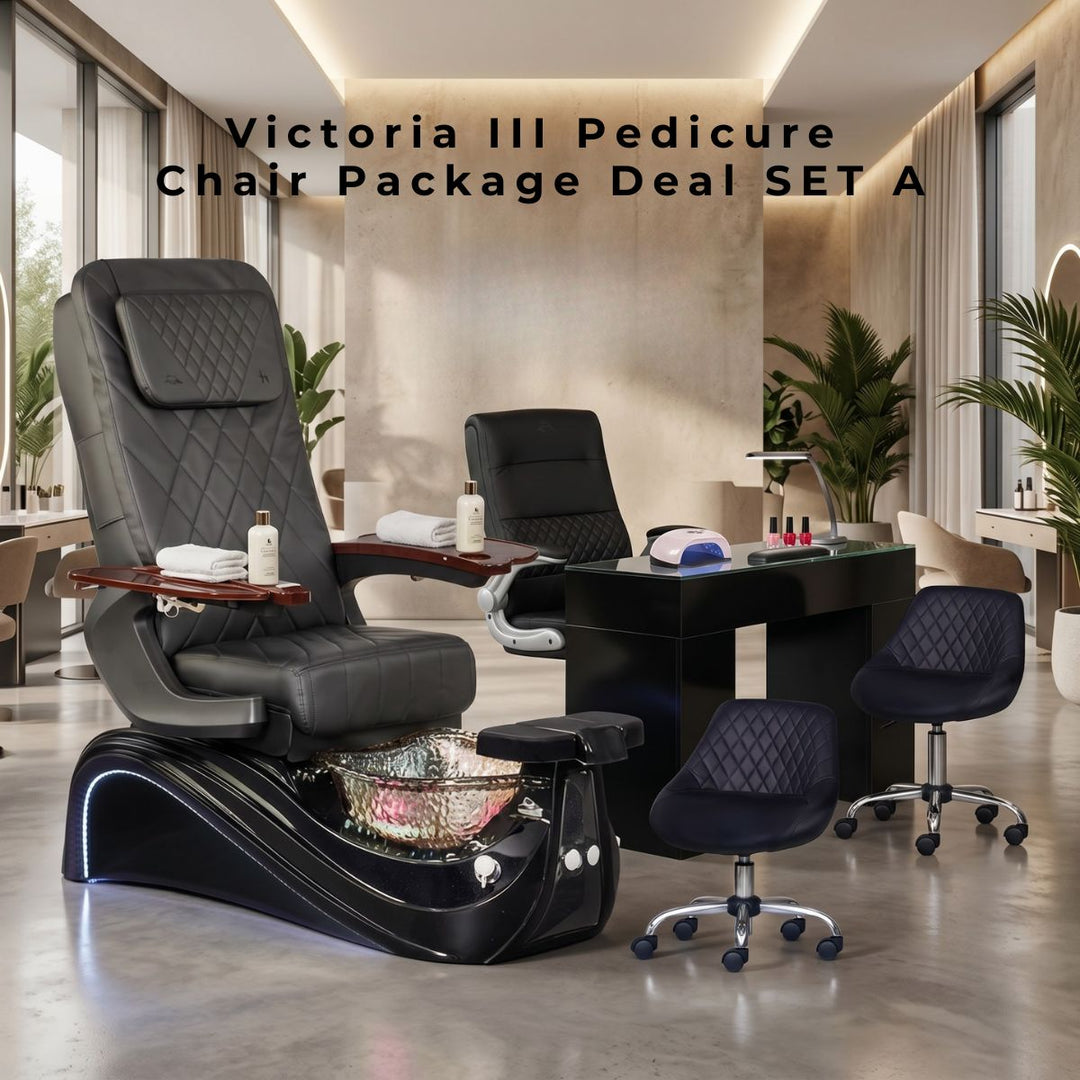 Victoria III Pedicure Chair Package Deal Set A featuring a black leather diamond-stitched pedicure chair with a glass bowl basin, LED accent lighting, a matching black glass-top nail technician table with a UV lamp, a technician chair, and two matching diamond-tufted rolling manicurist stools in a modern luxury salon setting.