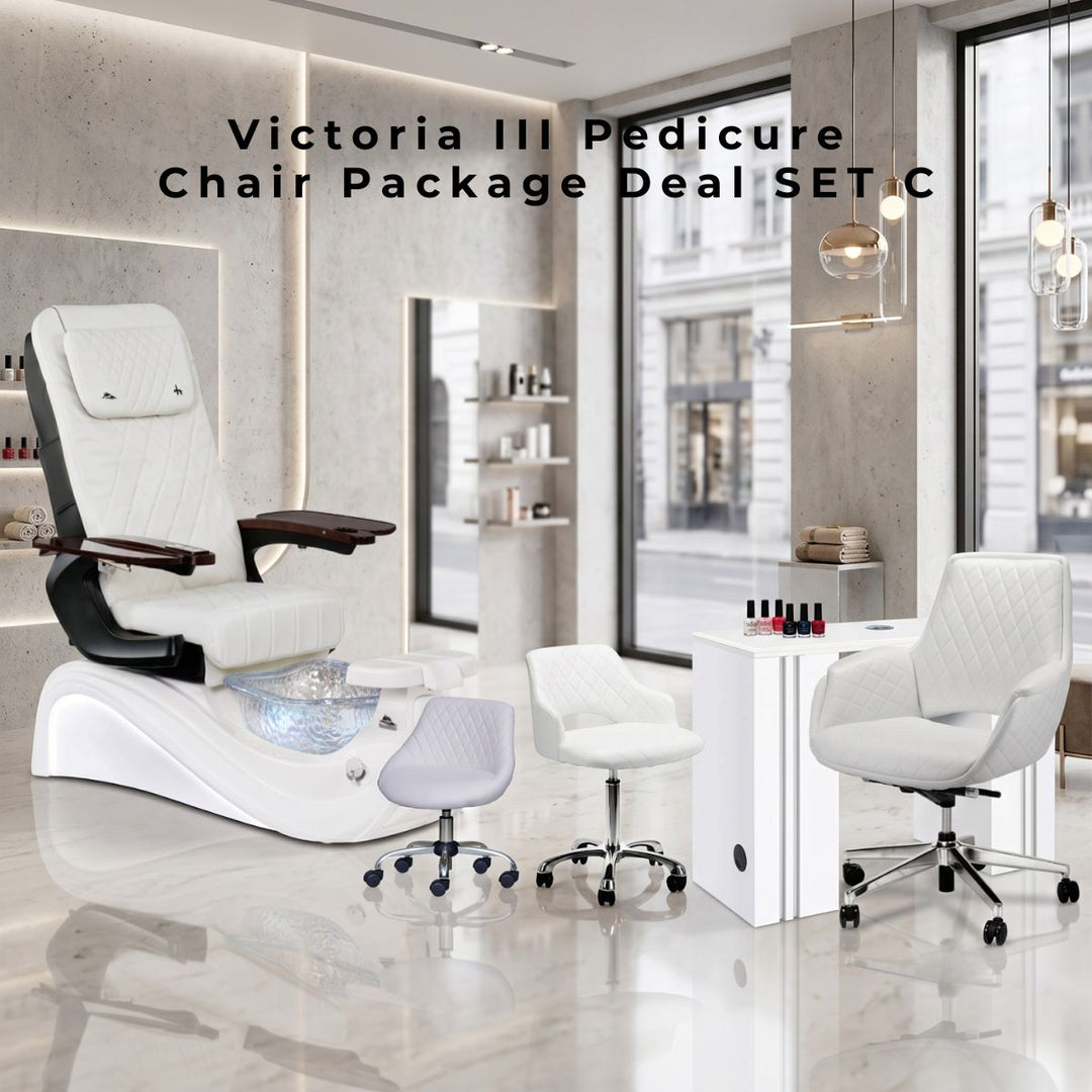 Whale Spa Victoria III Pedicure Chair Package Deal Set C featuring a white diamond-quilted vegan leather spa chair, a matching white manicure table, a client chair, and ergonomic technician stools in a modern luxury salon interior.