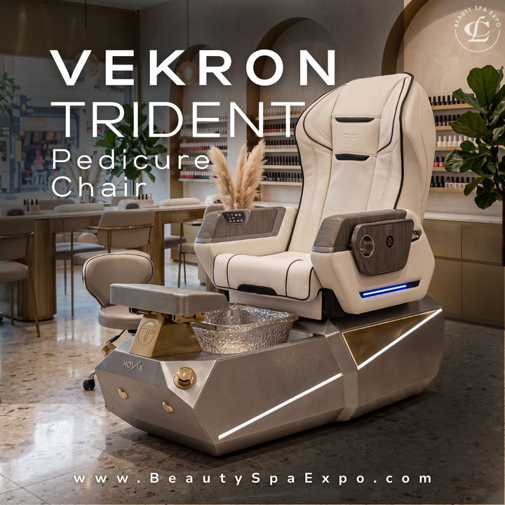 Vekron Trident luxury pedicure chair in white leather with metallic silver base, foot spa basin, and LED accents in a nail salon setting.
