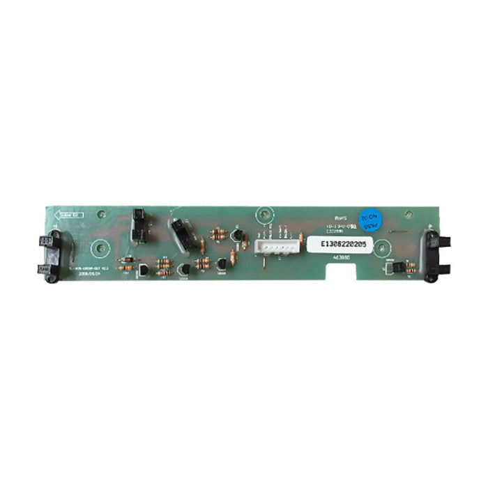 A green electronic circuit board with various electronic components, connectors, and a white label with a barcode, shown against a plain white background.